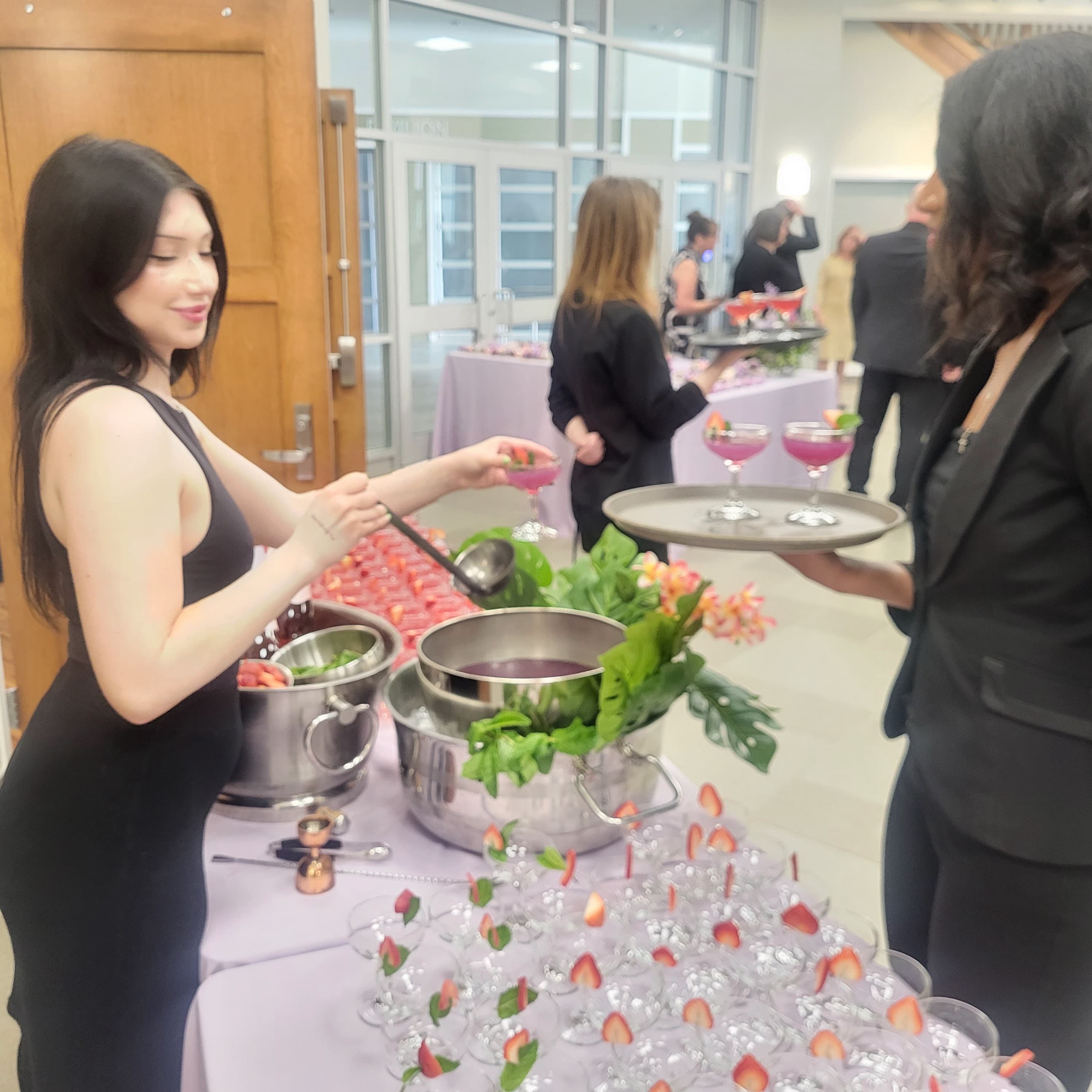 Master bartender crafting cocktails at Edmonton Bartending
